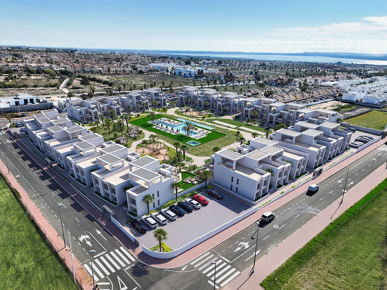 Obergeschoss-Wohnungen mit 2 Schlafzimmern, 2 Bädern, Dachterrasse, Klimaanlage, Einbauküchen mit Elektrogeräten, Kfz-Stellplatz und Gemeinschaftspool